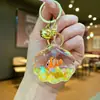 Llavero Creativo Serie Océano Relleno de Aceite Pez Payaso Estrella de Mar Pez Pequeño Colgante de Bolso Decoración de Llavero