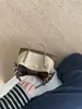 Bolso tote de diseño exclusivo estilo retro Chanel, nuevo bolso de hombro acolchado versátil 2026, bolso de mano de cadena a la moda