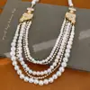 Collar de perlas multicapa vintage con cuentas y adornos de diamantes, cadena para la clavícula de lujo discreto, juego de joyería exquisito para mujer