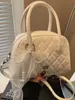Verão 2025 Nova Bolsa de Selim de Moda Tendência Portátil Feminina Bolsa Transversal de Moda Simples e Estilosa Bolsa Quadrada Pequena
