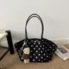 Otoño 2026 Nuevo Elegante Minimalista Lunares Gran Capacidad Ligero Nicho Chic Versátil Bolso de Hombro Único y de Mano