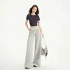 25 años primavera y verano nuevo diseño de encaje de color contrastante cintura elástica caída deportes casuales ligeramente holgados de campana pantalones para mujer