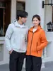 Nueva Chaqueta de Concha para Pareja Ropa de Trabajo Unisex con Capucha Primavera Otoño Exterior Cortavientos Impermeable Abrigo Deportivo
