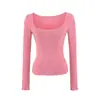 Camiseta sexy estilo americano de corte bajo con cuello en U grande para mujer con bolsillos de parche, costuras densas, corte ajustado, manga larga, top de base de manga larga de longitud corta