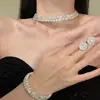 Super Flash Water Drops Full Diamond Tassel Colar Brincos Terno Feminino Court Light Luxo Nicho Design Lockbone Corrente Pescoço Acessórios