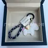 Dinero en el Caballo Cuero de Vaca Creativo Exquisito Casual Regalo de Pareja Bolso Lindo Colgante Llavero de Coche Llavero