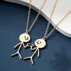 Estilo Nuevo Europeo y Americano Transfronterizo Acero Inoxidable Dos Corazones de Dibujos Animados Colgante de Pareja Hombre Palo Conjunto de Collares Venta al por Mayor