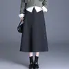 Saia midi elegante e versátil de cintura alta para mulheres, nova coleção outono 2026, saia elegante e que afina em linha A de mistura de lã
