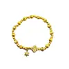 Nuevo Pulsera de Cuentas Doradas Arena Estilo Chino con Diseño de Estrella de Seis Puntas, Flor de Cuatro Hojas y Ojo de Gato, Versátil y Elegante con un Sentido de Lujo