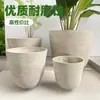 2025 nuevas decoraciones de plantas verdes para centros comerciales maceta de cemento maceta de grano horizontal para exportación venta de fábrica de cuatro piezas