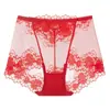 Ropa interior nueva para mujer de encaje sexy sin costuras de cintura media-alta talla grande hueca bragas para mujer transpirables y cómodas fabricantes