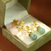Nuevos aretes de clip estilo chino forma de lágrima de calcita rosada, aretes clásicos, elegantes, de temperamento, versátiles para mujeres sin perforaciones.