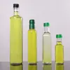 Venta al por mayor transfronteriza Botella transparente de aceite de oliva de 500 ml, Botella cuadrada de vidrio para aceite de camelia, Botella sellada de aceite de camelia, salsa de soja, vinagre, aceite