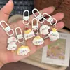 Chaveiro fofo de desenho animado de foca adorável, bolinho de pudim, charme feminino para mochilas de estudantes, presente para melhores amigos