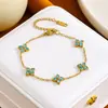Pulsera de trébol de cuatro hojas de acero de titanio transfronteriza europea y americana más vendida con pedrería para mujer, joyería exquisita de lujo ligero, pulsera versátil de estilo europeo y americano