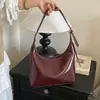Bolsa de ombro transfronteiriça de alta qualidade para mulheres, nova moda outono 2026, bolsa crossbody de couro macio, bolsa versátil para segurar na mão e sob o braço para mulheres