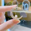 Broche de perla Estrella Brillante de alta gama para mujer, pin de Luna completo de Diamante, pin fijo para ropa anti-exposición, exquisito ramillete, pin de solapa