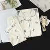 2026 Pijama Nuevo para Niñas Algodón Nube Primavera Manga Larga Estilo Popular Cuello Solapa Estudiante Lindo Dibujos Animados Conjunto de Ropa para Casa