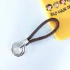 Chaveiro de corda trançada com anel duplo chaveiro de couro PU colorido novo pingente para bolsa feminina chaveiro para pendurar na cintura