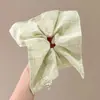 2026 Novo Scrunchie de Cetim Retro Francês Acessório de Cabelo Elegante Prendedor de Rabo de Cavalo Outono e Inverno Estiloso Acessório de Cabelo Lenço Quadrado