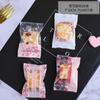 2026 Nuevas Bolsas de Empaque Estilo Ins Flor de Cerezo Copo de Nieve Pastelería Bolsas para Galletas Bolsas Selladoras para Caramelo Nougat Venta al por Mayor