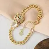 Tendencia de moda europea y americana hip hop pulsera de leopardo chapada en cobre oro real circón microincrustado pulsera de amantes al por mayor