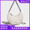 Bolso de mano de diseño de nicho transfronterizo nuevo para mujer, versátil y elegante, bolso cruzado con cadena para el hombro, bolso tipo dumpling de luna creciente