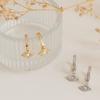 Europa y Estados Unidos nuevo estilo de lujo aretes ojo de diablo moda personalizada aretes de cobre con diamantes joyería para mujer al por mayor
