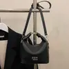 Bolso pequeño de alta calidad con textura para mujer, nuevo diseño de nicho, elegante bolso cuadrado pequeño de mano, bolso de hombro y cruzado
