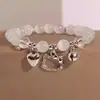 Arcoíris de verano ~ pulsera de nicho de color pequeño y fresco dopamina pulsera elástica de alta gama para mujer de verano al por mayor