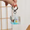 Llavero de Dibujos Animados con Aceite y Lentejuelas Lindo Colgante de Rubí Adorno Colgante de Acrílico con Arena Movediza Regalo de Graduación