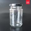 Venta al por mayor de fábrica botella de vidrio para alimentos de 200 ml botella de vidrio resistente a altas temperaturas botella de vidrio para miel botella de vidrio para mermelada