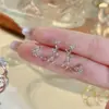 Presilhas de Orelha Versáteis Exquisitas Populares Coreanas com Laço, Acessórios de Orelha Coil de Mosquito de Design de Luxo Leve de Nicho de Ponta Sem Furo