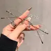 Gafas de prescripción ultraligeras para mujer con un aspecto sofisticado de alta gama, sin montura, montura metálica que bloquea la luz azul, gafas sin montura puras y deseables