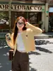 Suéter Cardigan Vermelho para Mulheres 2025 Novo Outono e Inverno Peça Externa Tricô Torcido Pequeno Casaco Top Outono e Inverno
