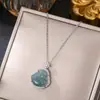 Cadena de clavícula de acero de titanio estilo retro nacional moda candado de paz de jade colgante de izaje todo partido temperamento accesorios de estilo chino de alta calidad