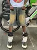 Shorts de mezclilla estilo retro americano lavado de alta calle para hombre y mujer, rectos de pierna ancha, desgastados, holgados, casuales, versátiles, pantalones cortos
