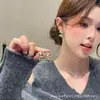 Pendientes de Aleación de Cobre 2025 Nuevo Estilo Popular Pendientes Personalizados de Lazo Versión Coreana Estilo Simple Versátil Lujo Ligero Chapado en Oro