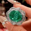 2026 Nuevo Zhuangshengsheng Joyería Cobre Chapado en Oro Espinela Azul Imitación Anillo con Colgante de Gota para Mujer 15*18