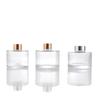 Suministro en stock botella de vidrio cilíndrica plana para aromaterapia 150ml blanco cristal fondo grueso imprimible logo multicolor