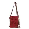 Bolso Móvil Versátil Transfronterizo para Mujer 2026 Nuevo Estilo Étnico Cuerda de Cuero Bolso Cruzado de Moda Tagi Estilo Étnico