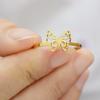 Anillo de mariposa de acero de titanio nuevo de ala a ala transfronterizo, moda, personalidad, apertura ajustable, joyería de productos pequeños de Yiwu