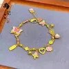 Pulsera de calabaza mariposa oro antiguo de alto color láser tienda de oro con joyería flash nicho lujo cuatro hojas