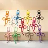 Hebilla de puerta de color macarrón con lazo y cinta, accesorios de joyería DIY hechos a mano con cuentas, llavero de dibujos animados
