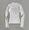 Outono e Inverno 2026 Europeu e Americano Transfronteiriço Estampado Camiseta Y2K Moda Elegante Feminina Atacado Moderna Versátil Cruz