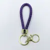 Venta al por mayor del fabricante Llavero de Cuerda de Aleación Tejida y Cuero Accesorios Colgantes Material PU Bolsas Pequeñas de Regalo Accesorios para Llaveros