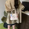 Bolsa Graffiti Exquisita para Mulheres 2025 Novo Estilo Versátil Bolsa de Ombro Grande Capacidade Tendência Bolsa Feminina Bolsa de Mão Transversal