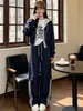Conjunto de moda de dos piezas con sudadera con capucha estilo europeo de retazos para mujer, nuevo modelo otoño e invierno 2026, conjunto de dos piezas con forro polar para mujeres petite
