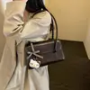 Versátil bolso pequeño de cuero encerado estilo ins para mujer, nuevo bolso cuadrado retro para el antebrazo 2026, bolso de hombro texturizado para el otoño/invierno