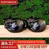 Venta al por mayor en vivo cristal natural obsidiana dorada gato durmiendo gato de la suerte tallado de obsidiana gato propenso adornos de escritorio